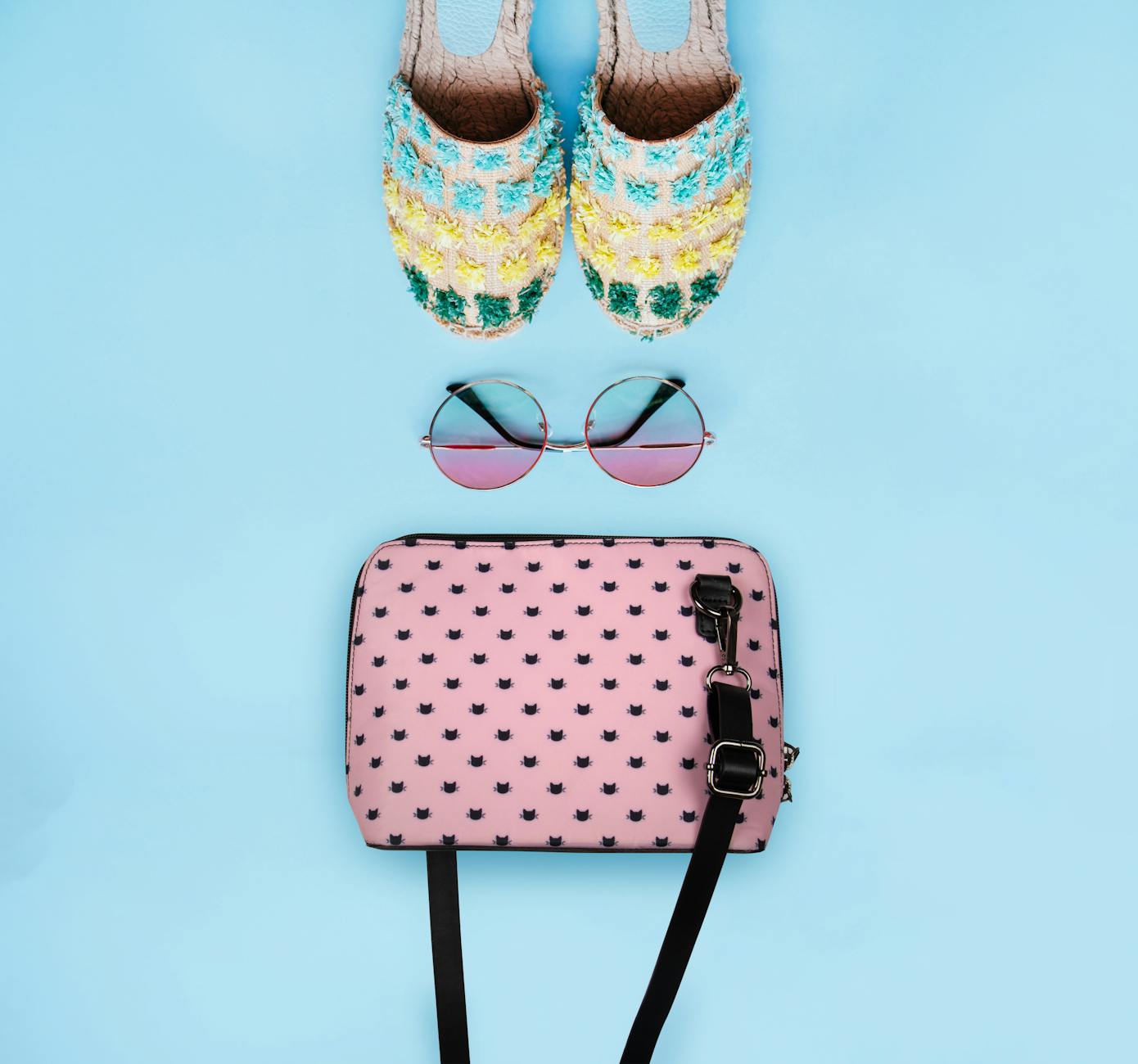 Glossy Bags and Accessories That Anchor the Collection