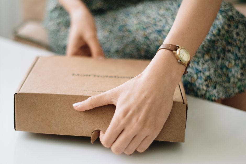 Jewelry package being opened after delivery